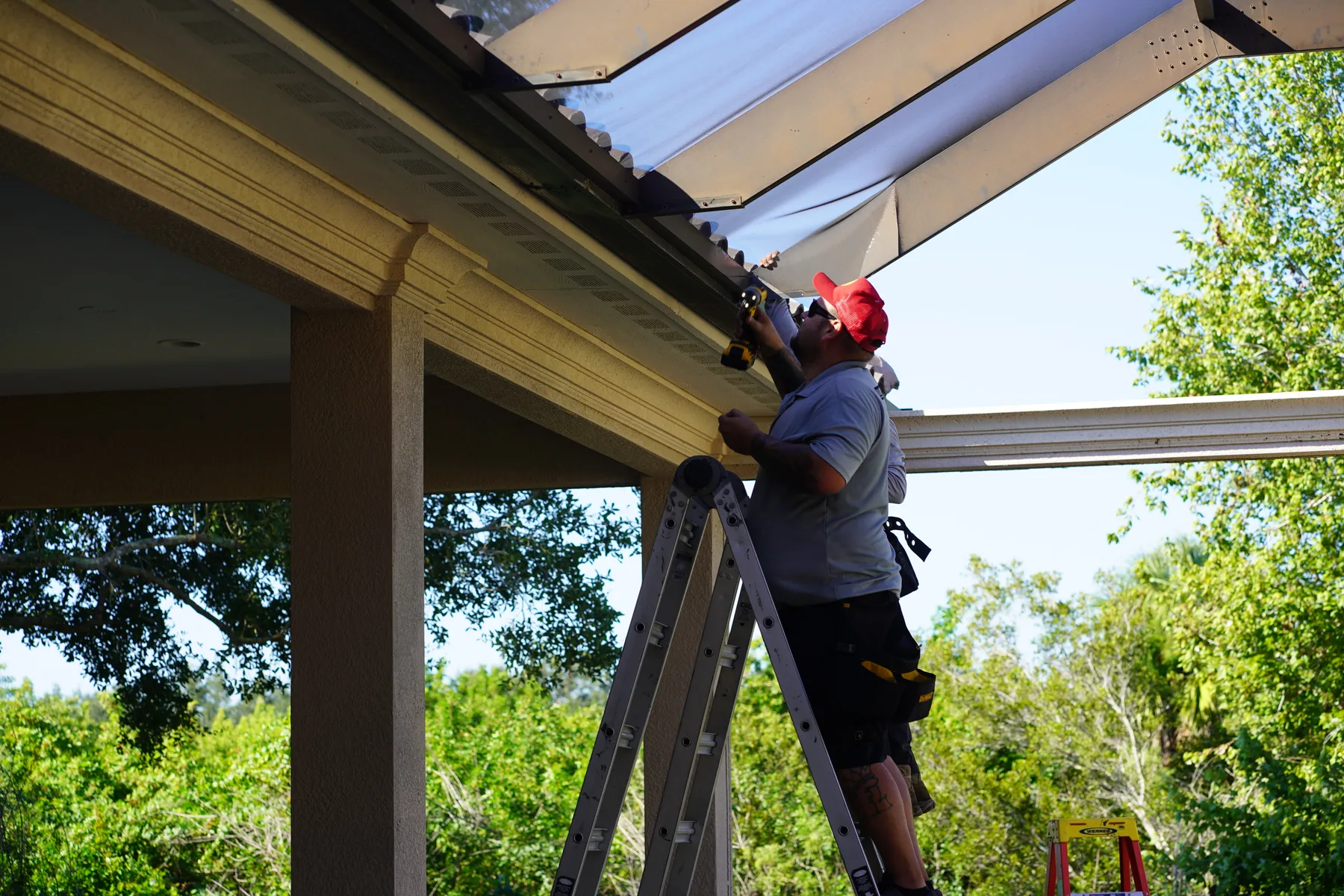 Craft detail during installation of a custom aluminum enclosure