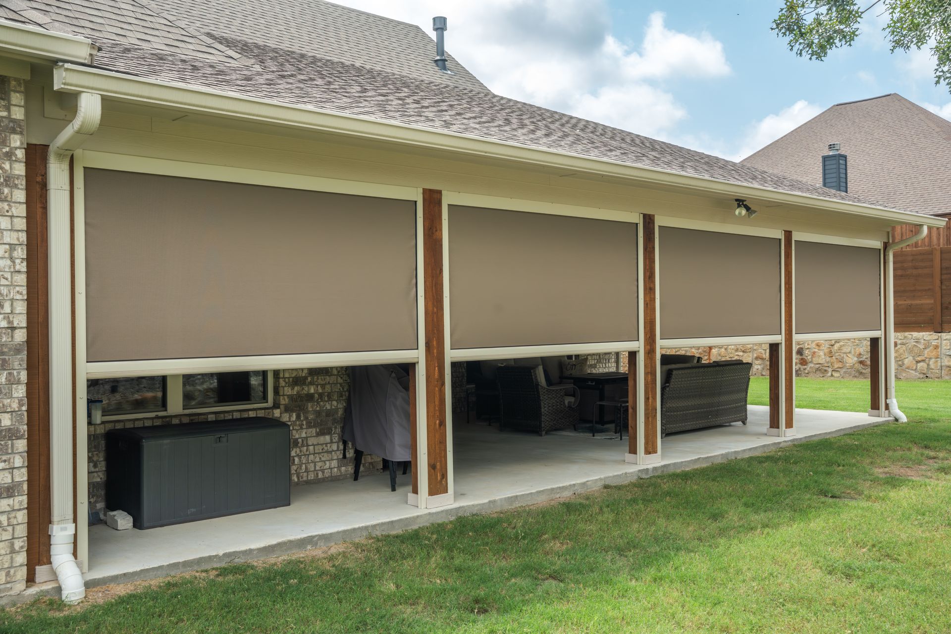 Screened patio room with pool and covered outdoor seating